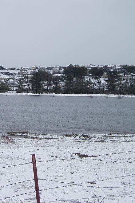 bass lake with snow